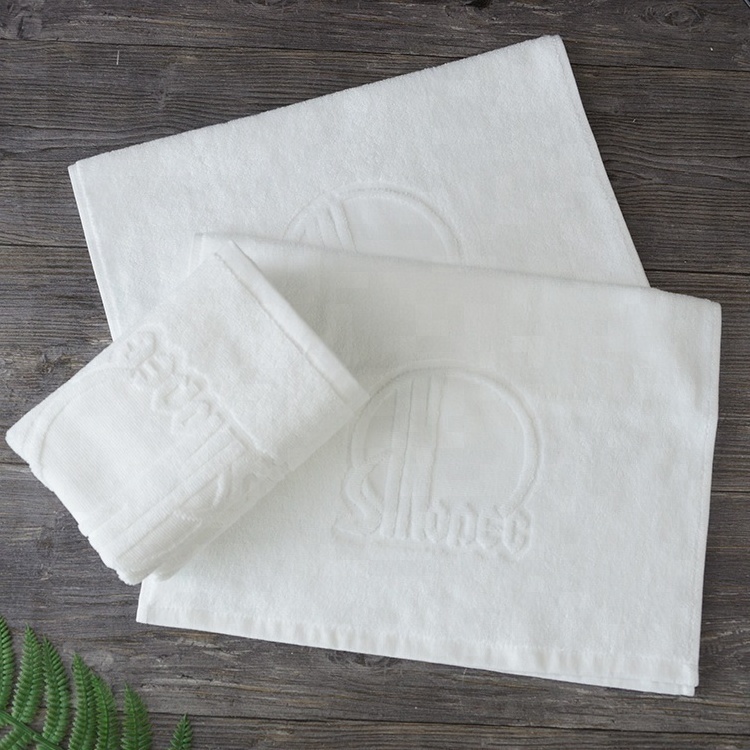 Professional custom white towel 100% pakistan cotton plain hand towels with jacquard logo for hotel