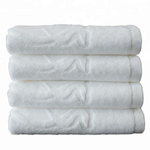 Professional custom white towel 100% pakistan cotton plain hand towels with jacquard logo for hotel