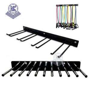 wall mount yoga mat organizer display rack for belts tubing jump rope and garden tools rack