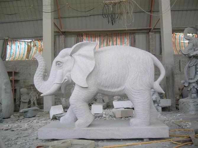 Small grey white granite elephant water fountain