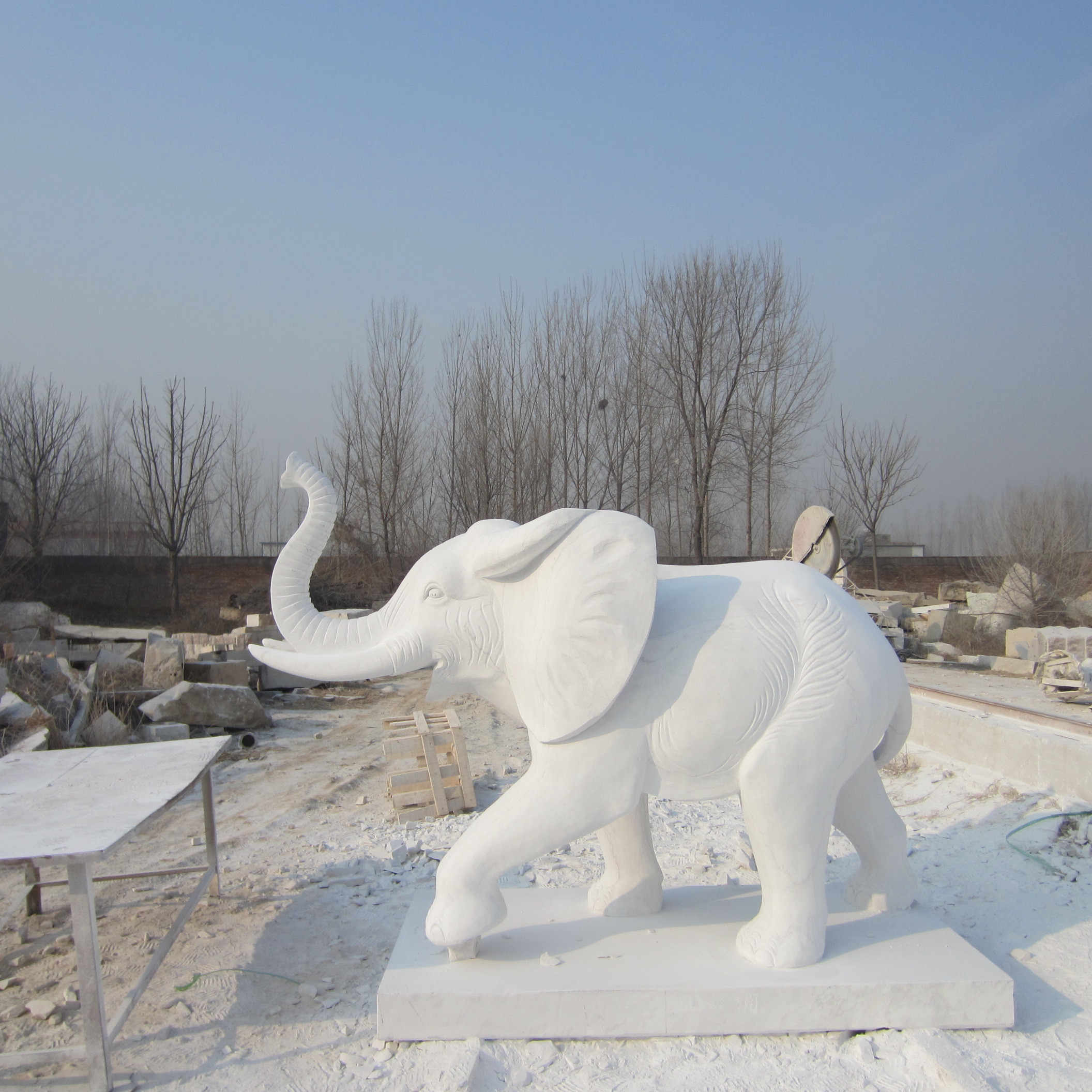 Small grey white granite elephant water fountain