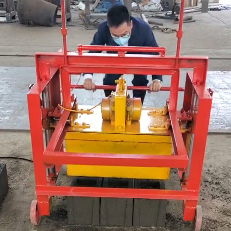 Hot selling small mobile egg laying type simple operation cement concrete brick making machine