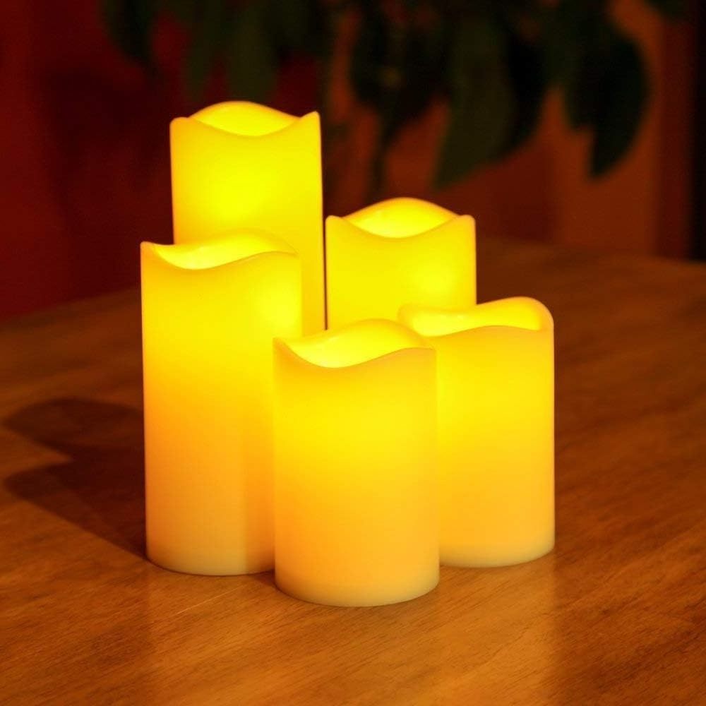 2023 Hot Sale Wholesale Solar LED Candle Light New Design Solar Powered Yellow Flashing Effect Flameless Led Tea Light Candles