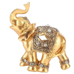 Resin gold elephant decorated statue. Good luck decorated with elephant statues