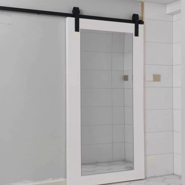 Sliding doors with magic sliding doors that fully hide hardware and track wooden doors with wall-mounted hidden sliding systems