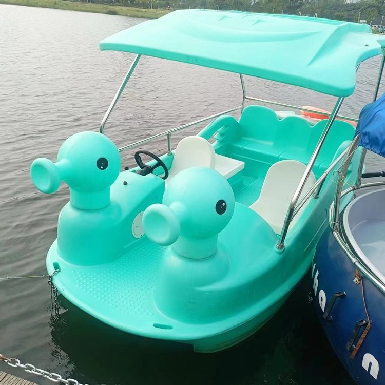 Chinese product durable fiberglass swan electric pedal boat for family yellow duck electric boat