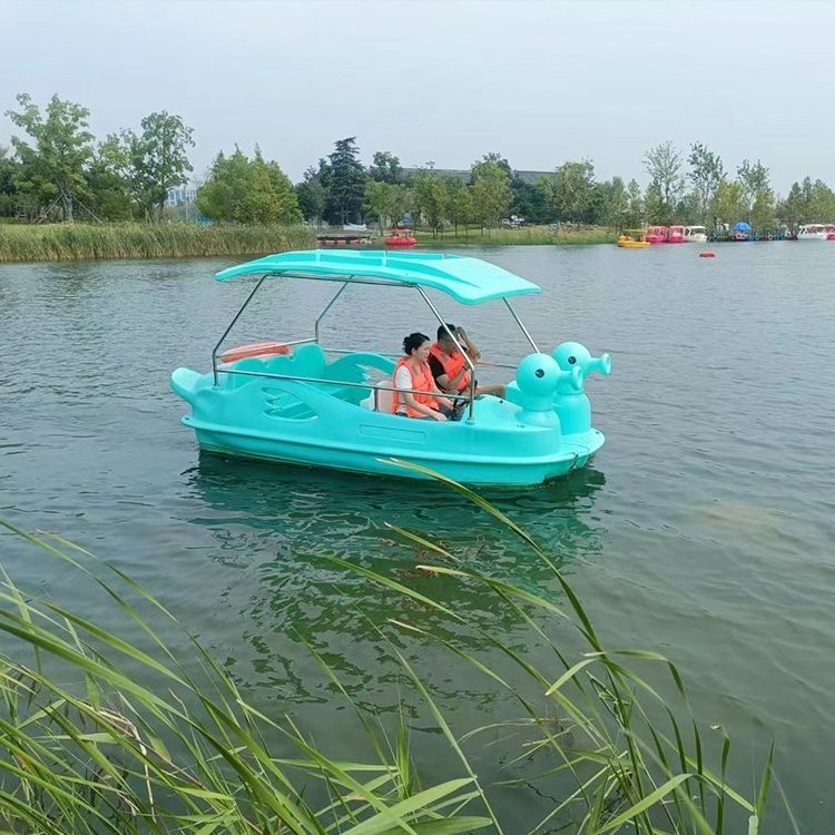 Chinese product durable fiberglass swan electric pedal boat for family yellow duck electric boat