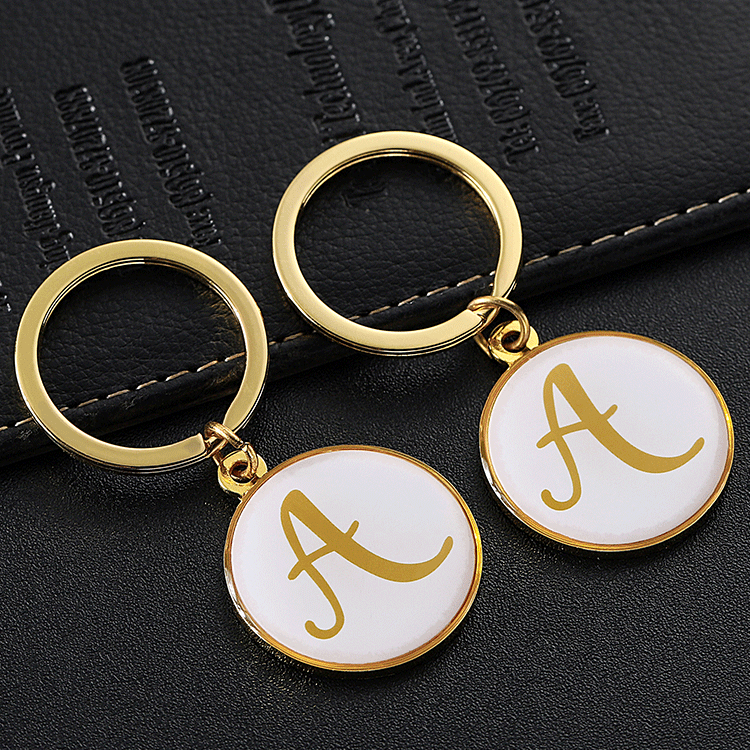 Design good quality custom front epoxy resin back 3D effect gold plated logo metal key chain