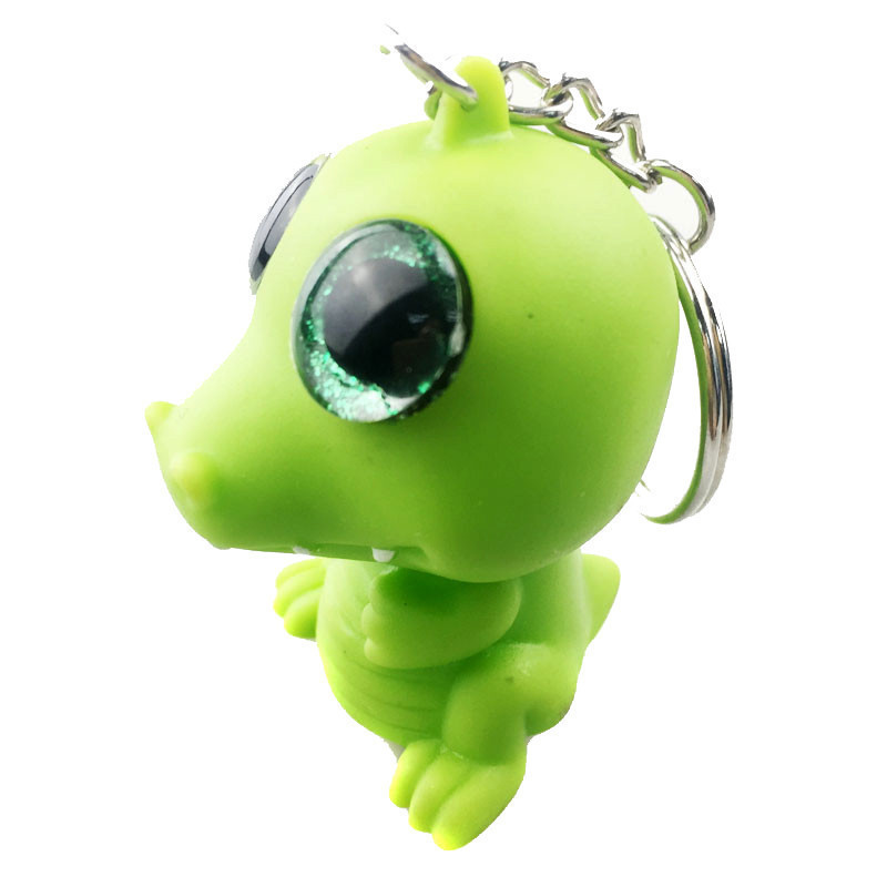 Promotional crocodile glitter eyes pop plastic keychains 3d custom crocodile soft pvc keychains