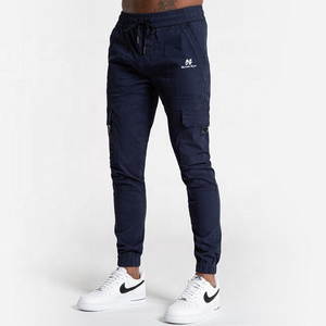 Navy blue color canvas fabric six pocket men cargo pants manufacture by Hawk Eye Sports ( PayPal Verified )