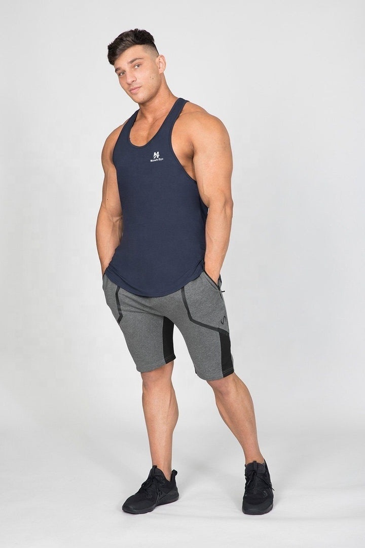 Navy blue color cotton stretch fitness stringer vest manufacture by Hawk Eye Sports ( PayPal Verified )