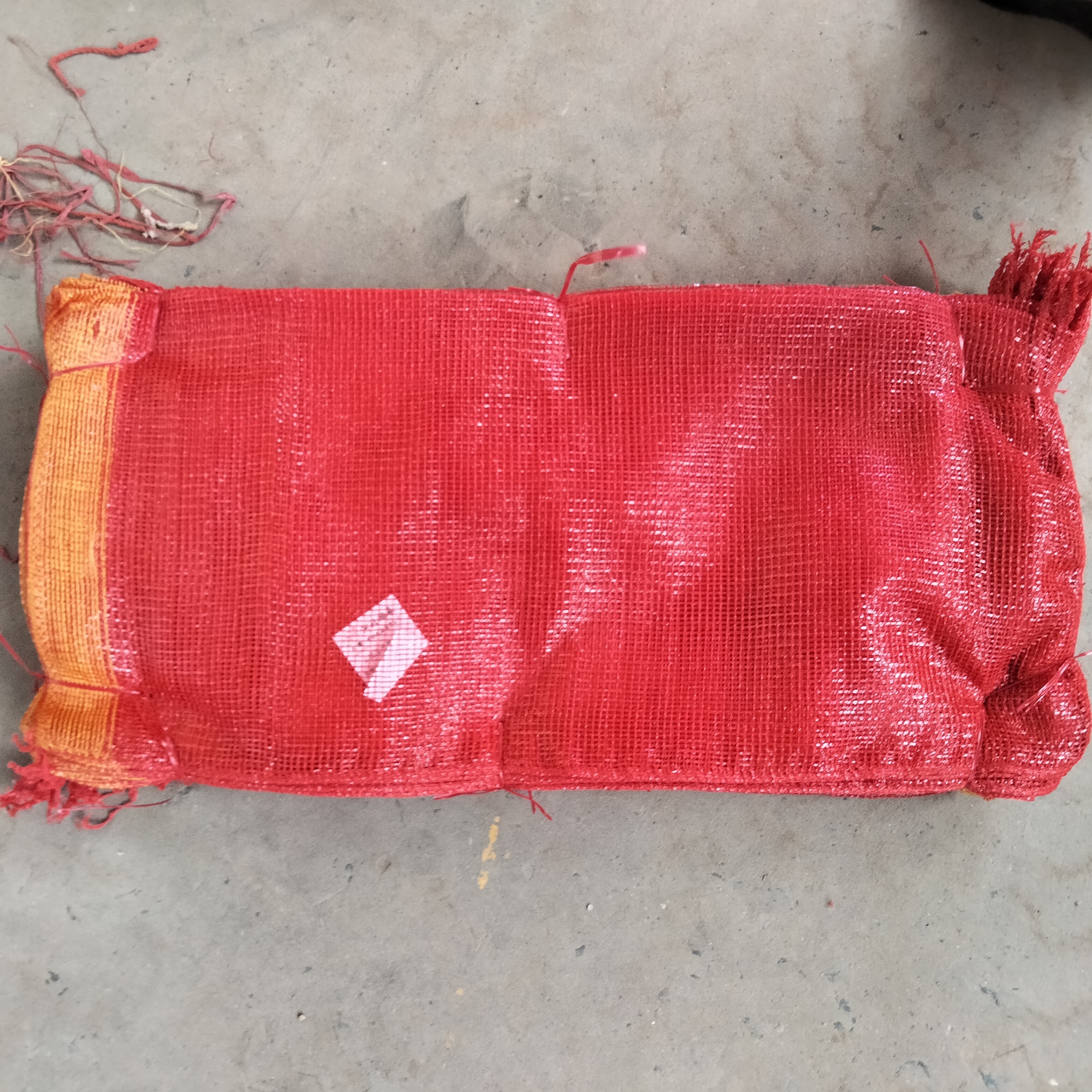 25kg 50kg Red color pp material drawstring mesh bags for oranges lemon fruit