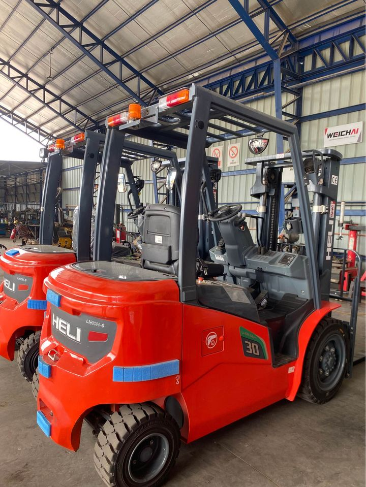 Heli montacargas elektrikli diesel hydraulic forklift truck price 5 ton fork extension 3 ton spare parts side loader