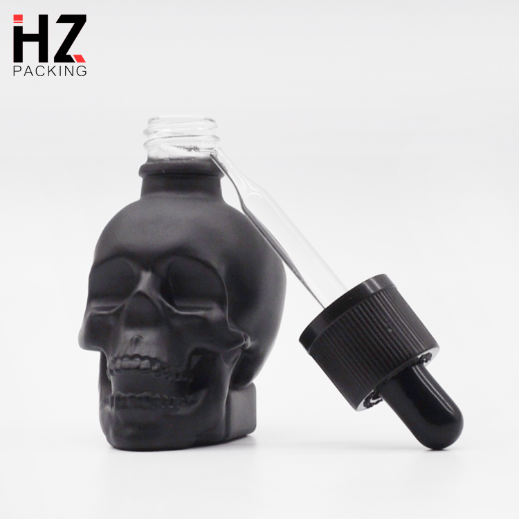 custom made black frosted skull shape glass dropper perfume bottle