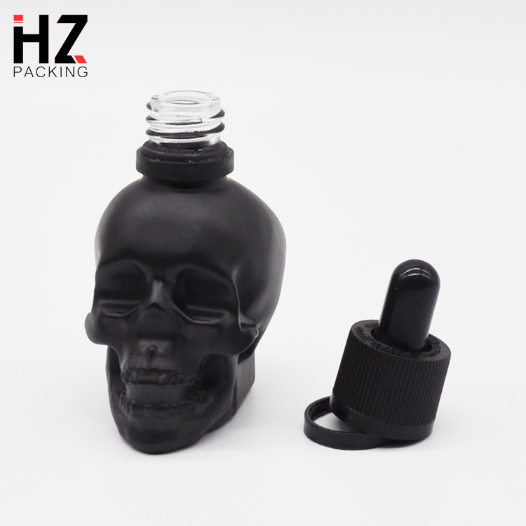 custom made black frosted skull shape glass dropper perfume bottle