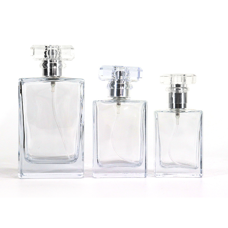 Custom Made Empty Rectangle Clear Perfume Bottle Empty 30ml 50ml Square Refill Travel Glass Perfume Spray Bottle with Pump Cap