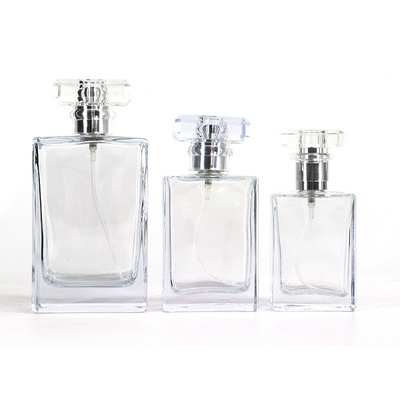 Custom Made Empty Rectangle Clear Perfume Bottle Empty 30ml 50ml Square Refill Travel Glass Perfume Spray Bottle with Pump Cap