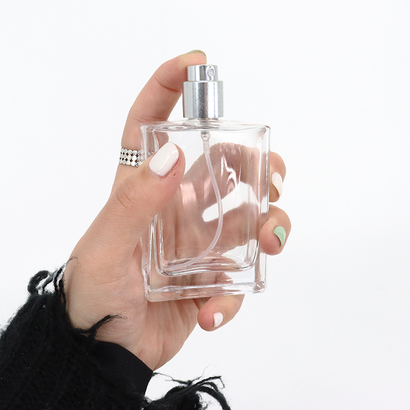 Custom Made Empty Rectangle Clear Perfume Bottle Empty 30ml 50ml Square Refill Travel Glass Perfume Spray Bottle with Pump Cap