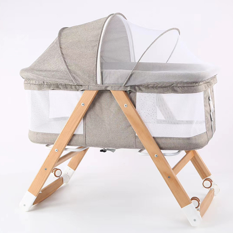 Newborn wooden baby cradle portable folding crib bedside bed