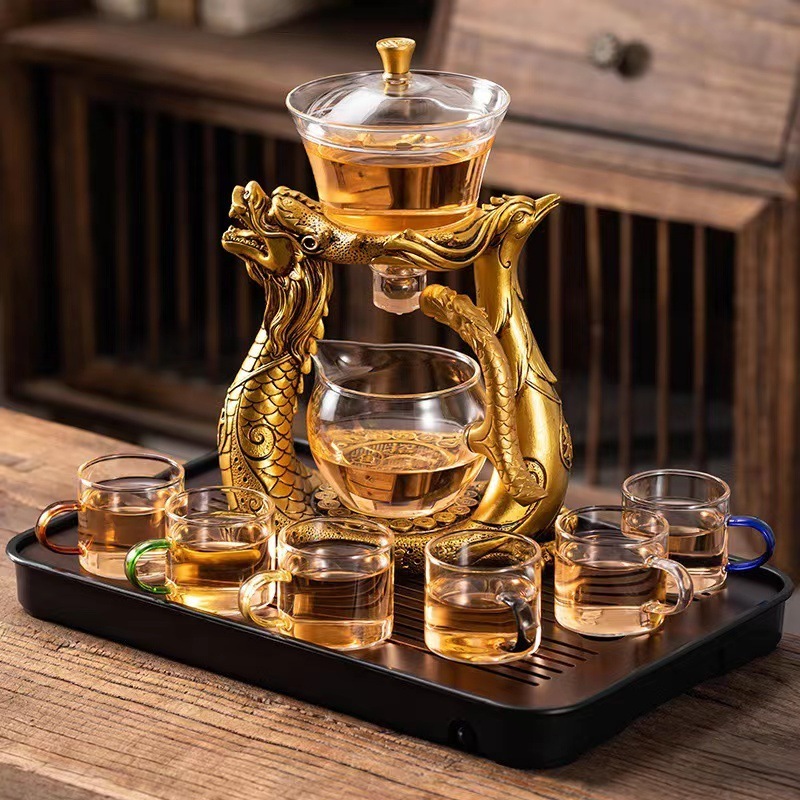 Chinese Creativity high borosilicate Magnetic Water Diversion Rotating Semi-Automatic Glass Tea pot set with teapot