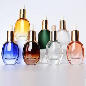 Luxury cosmetic packaging 30ml glass dropper bottle oval shape lotion bottle 50ml 100ml with rose gold pump cap face cream jars