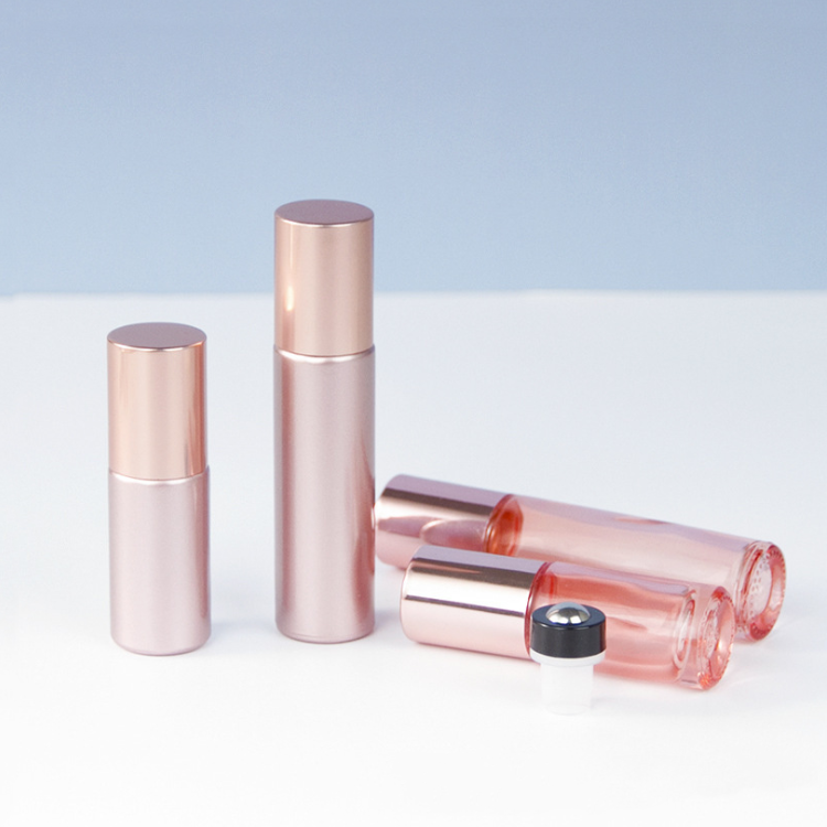 10ml pink rainbow color glass roll on bottle with crystal gemstone/steel roller rose gold cap for perfume essential oil