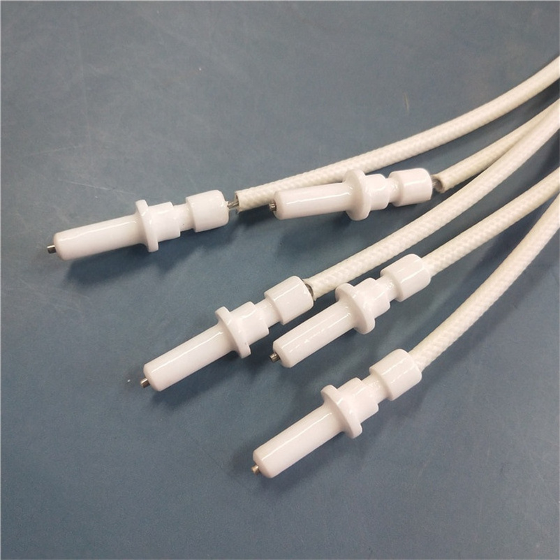 Spark plug ceramic electrode piezoelectric igniter