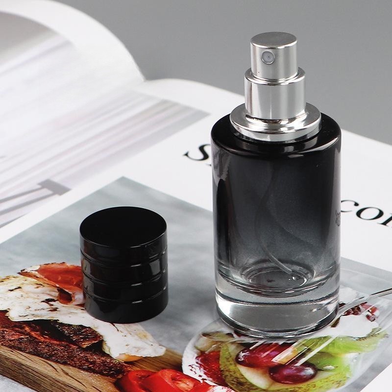 Luxury Cosmetic Packaging Portable cylinder gradient black glass 30ml perfume bottle with press spray