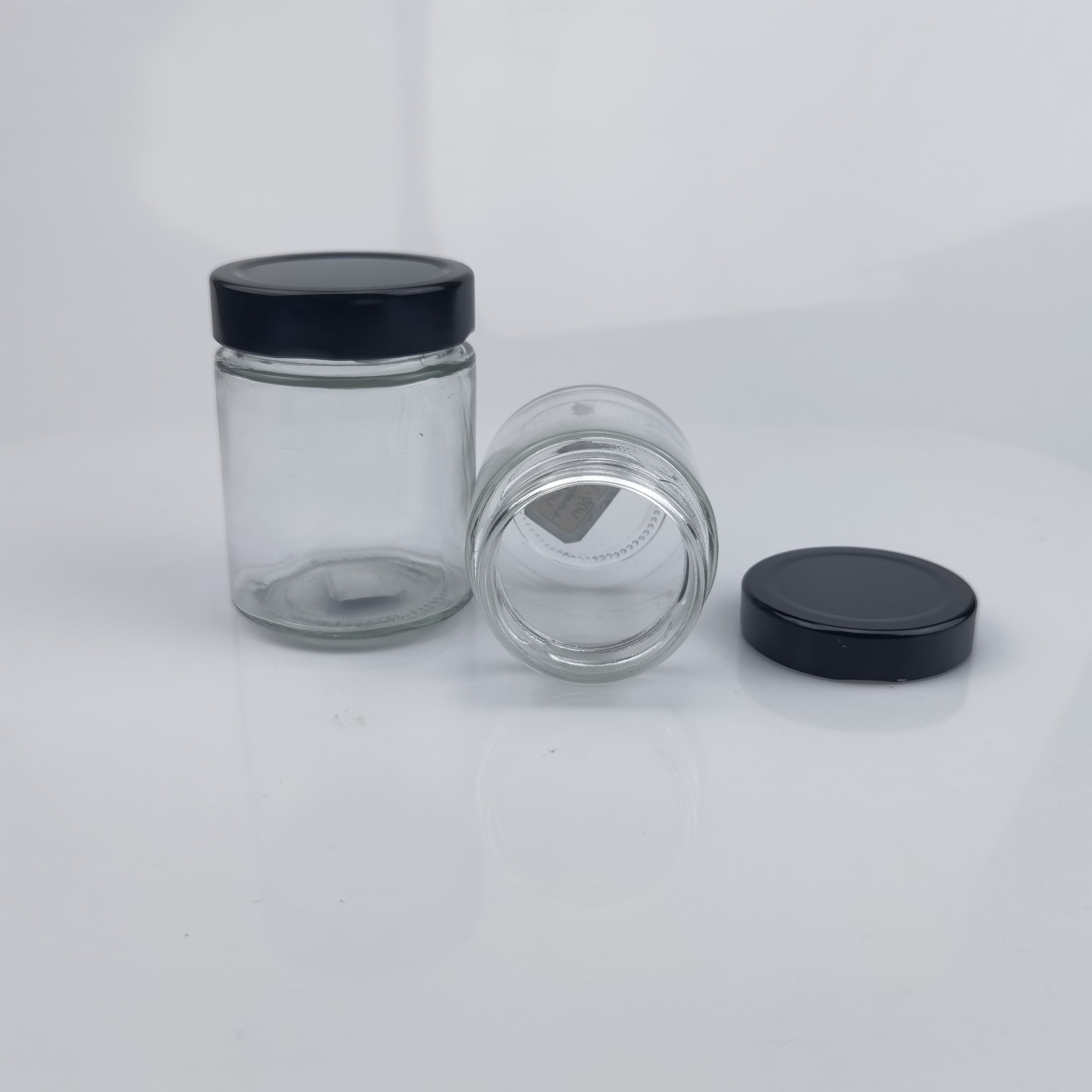 Factory Price 100 ML 220 ML 280 ML 500 ML Ergo Straight Round Side Ergo Glass Honey Jars With Twist Off Lids