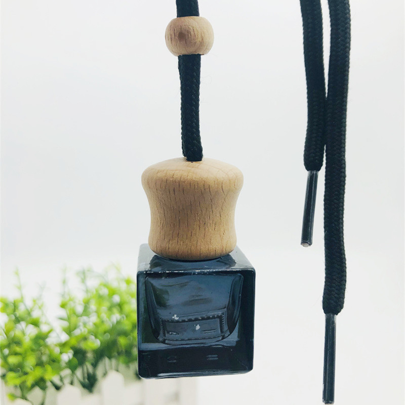 Wholesale 10ml air freshener diffuser empty frosted black car hanging perfume bottle with wooden cap