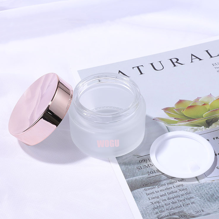 Hot sale empty face care cosmetic packaging 20g 30g 50g frosted rose gold pink glass cream cosmetic jars