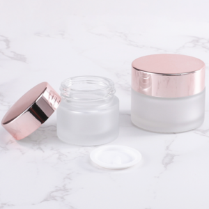 Hot sale empty face care cosmetic packaging 20g 30g 50g frosted rose gold pink glass cream cosmetic jars