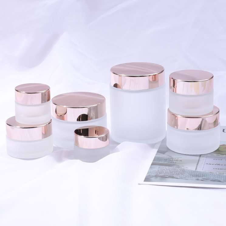 Hot sale empty face care cosmetic packaging 20g 30g 50g frosted rose gold pink glass cream cosmetic jars