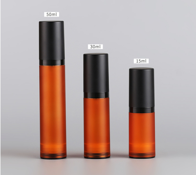 Stock matte orange cosmetic airless bottle 15ml 30ml 50ml empty facial serum lotion container plastic pump spray bottles