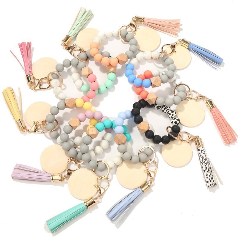 Top Selling Colorful Monogram Leather Tassel Bracelet Keychains Silicone Bead Wristlet Wood Blank Disc For Keychain