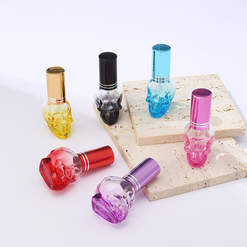 Skull like glass 8ml perfume glass skull bottle for essential oil spray colored nail polish glue thick bottom bottle with lid