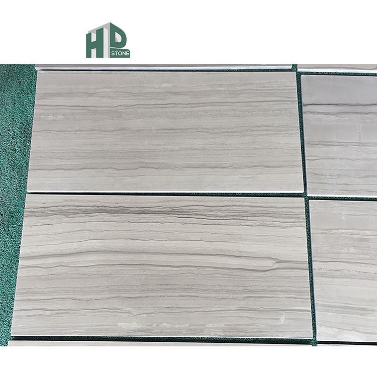 The price is cheaper polished wall tile wood veins marble factory