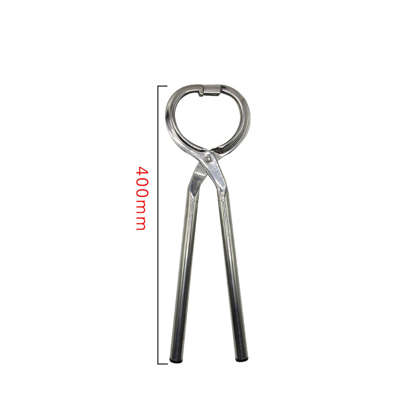 A large stainless steel pliers that can punch a calf's nose to fit a large bull nose ring