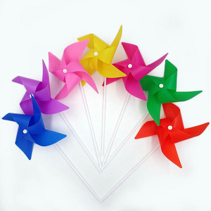 Colorful windmills as gifts for children to play with or decorative garden plastic windmills as wedding holiday supplies for edu