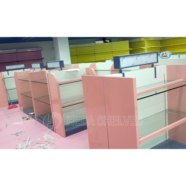 Multifunctional Pink Supermarket Shelf Makeup Gondola Shelves Used To Market Luxury Trpe Double Surfaces Back Plate