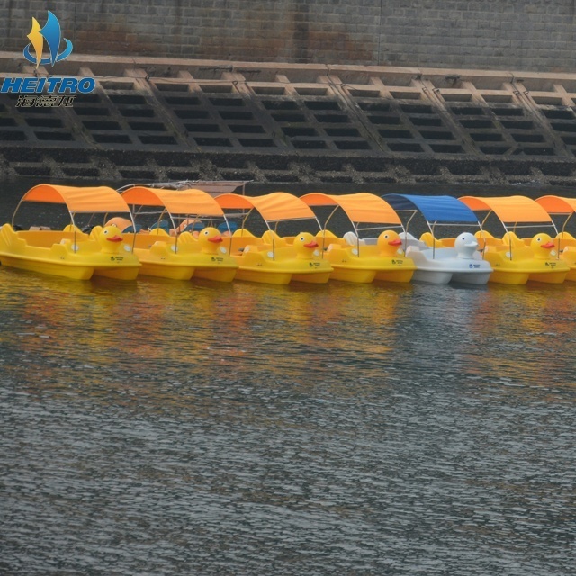 yellow duck pedal and electric boat for amusement park or lake