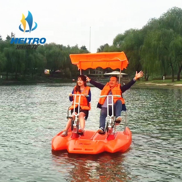 PE pontoon boat two person plastic boat water surfing pedal bike for sale