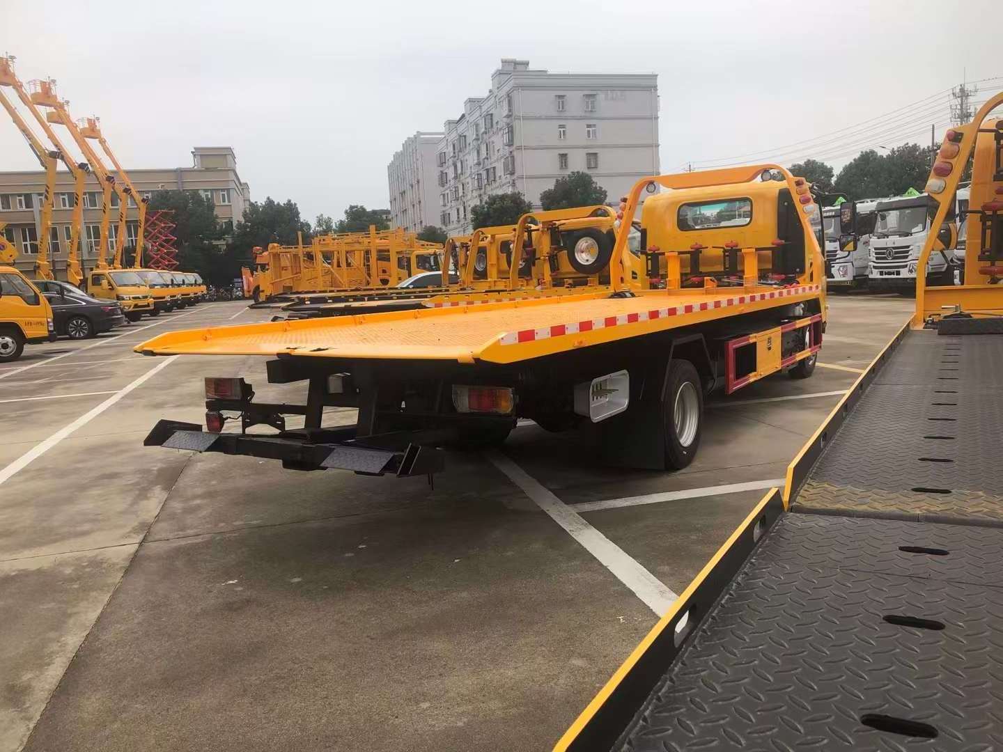 China New ISUZU 5Tons Flatbed Towing Truck 4x2 Wrecker Isuzu Tow Trucks For Sale