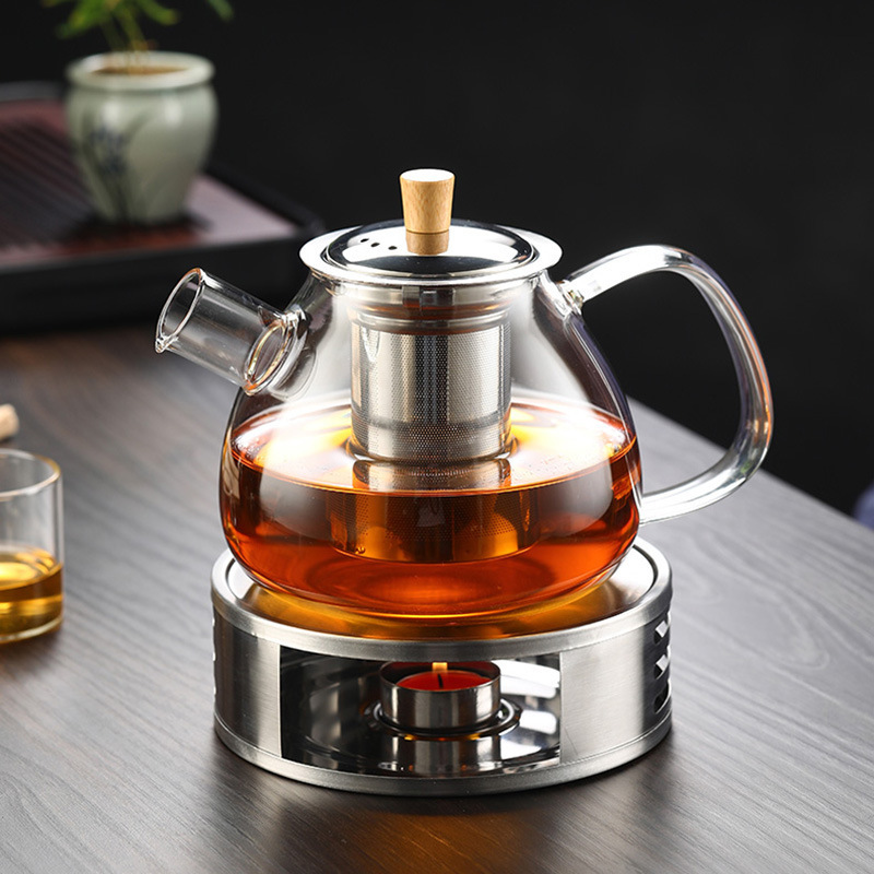 Glass teapot with wooden lid handle