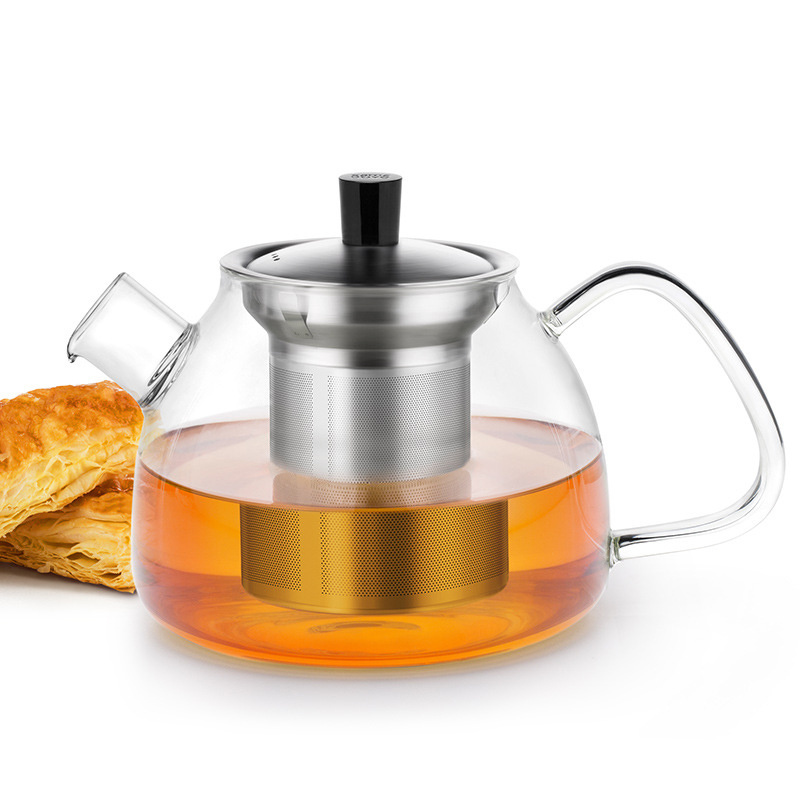 Glass teapot with wooden lid handle