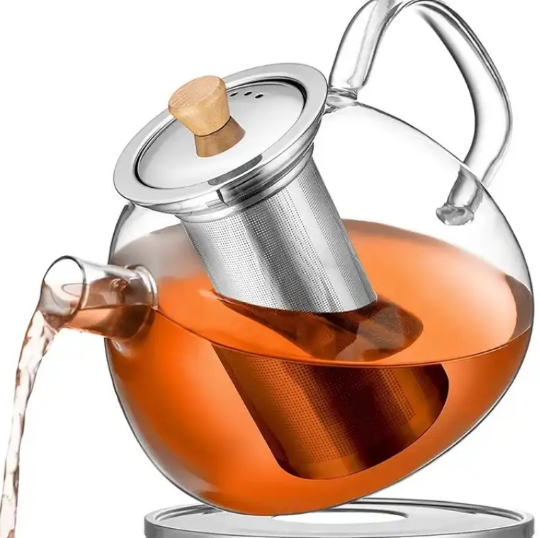 Glass teapot with wooden lid handle