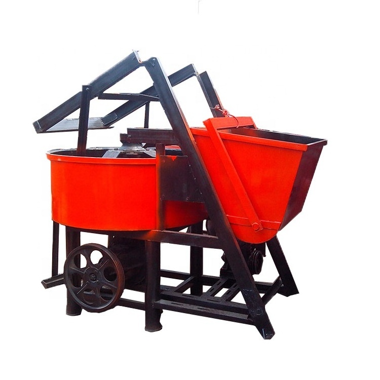 Vertical self loading concrete pan mixer