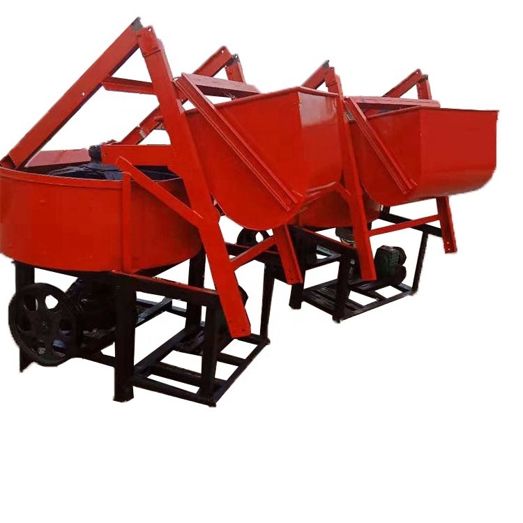 Vertical self loading concrete pan mixer