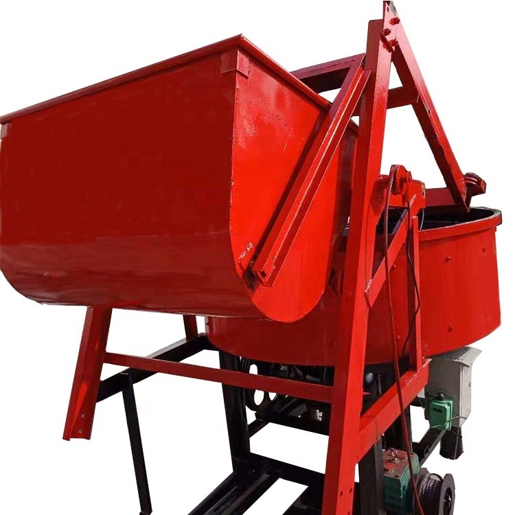 Vertical self loading concrete pan mixer