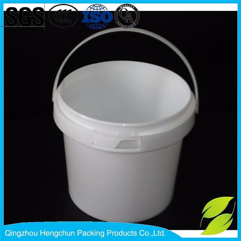 white plastic bucket with metal lid